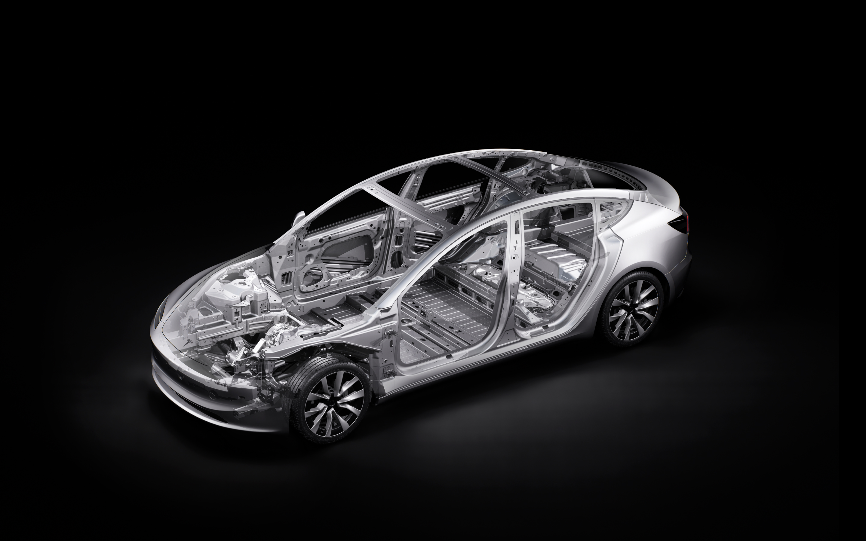 Side view of a Model 3 chassis with callouts pointing to various safety features. 